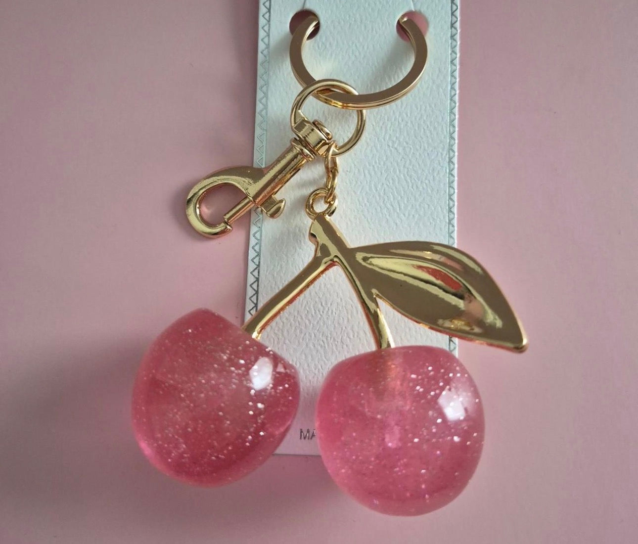 Buy one get the other FREE  Cherry Charm Keychain 🍒✨ the other color is pink or color red this one in the picture is cherry red  you buy one get one free !!!